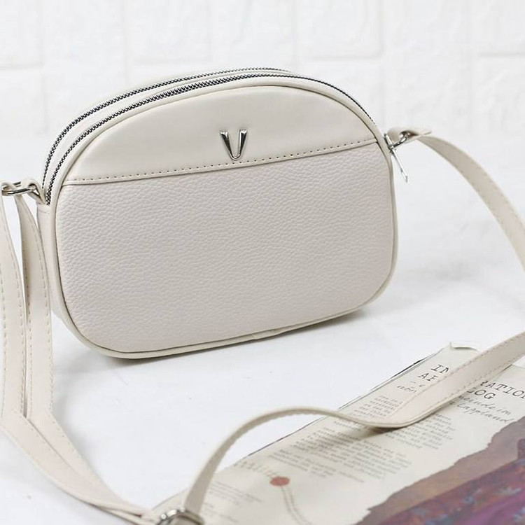 کیف طرح V بیضی جنس چرم یراق خارجی WOMENS BAG